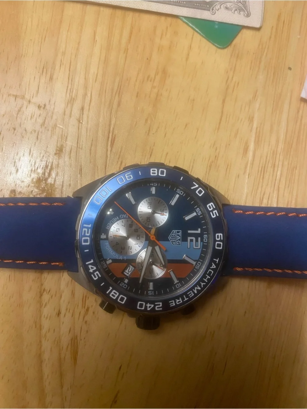 New Tag Heuer Blue Dial Watch with Orange Accents